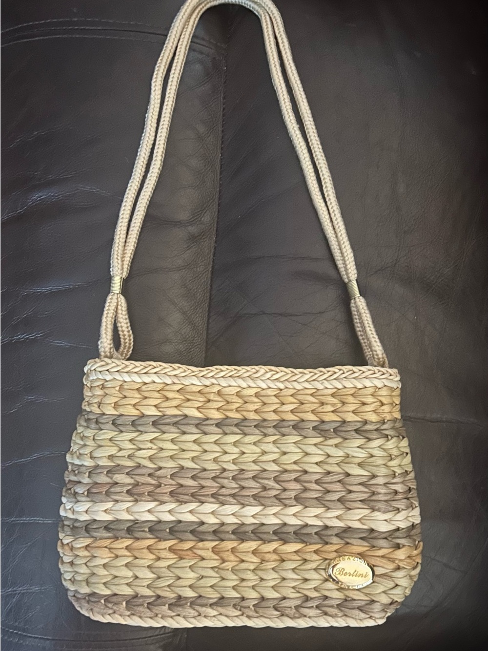 Berlini woven straw shoulder bag